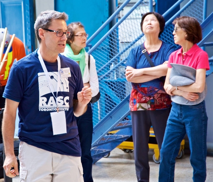 volunteer leading the dome tour on DDO opening day