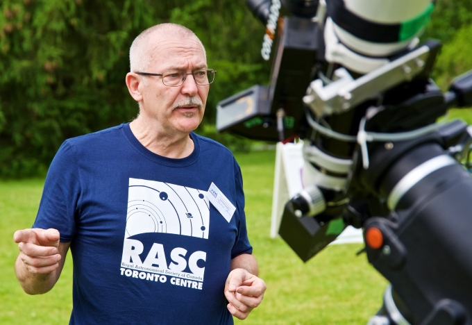 volunteer at telescope on DDO opening day