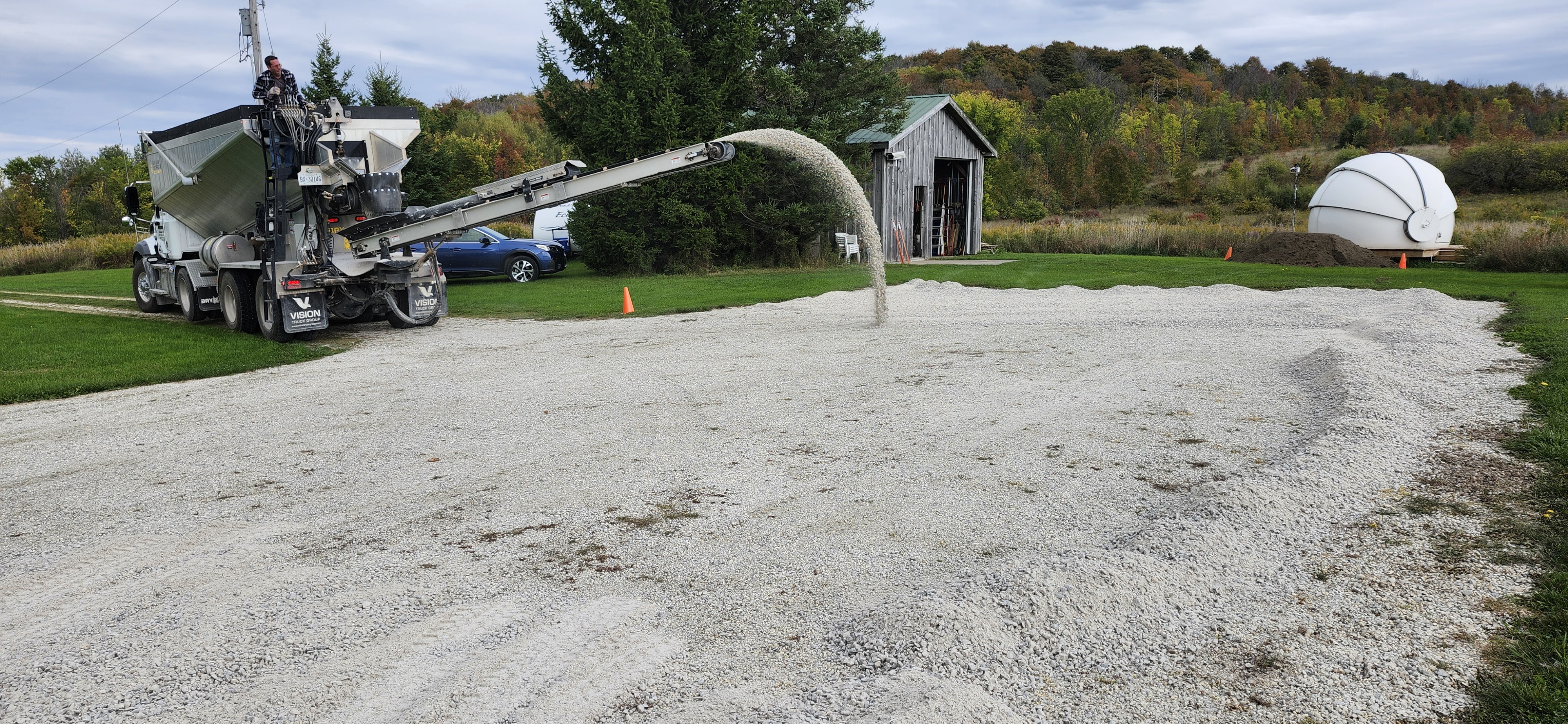 Adding the gravel for the new parking lot