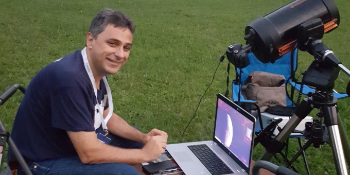 RASC volunteer at an evening star party